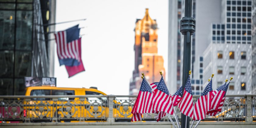 US flags and a bridge